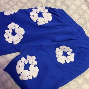 Denim Tears Blue Shorts with White Floral Design